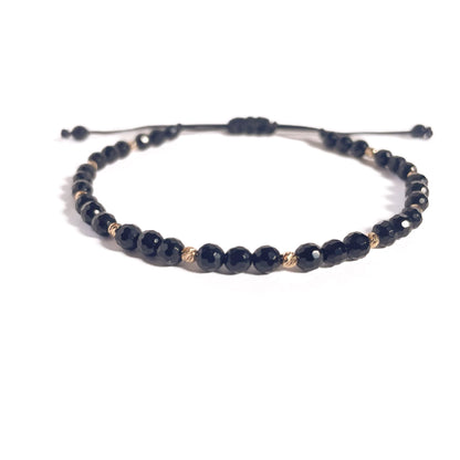 Brățară Onix fațetat 4 mm cu bile din aur 14K pe șnur reglabil negru