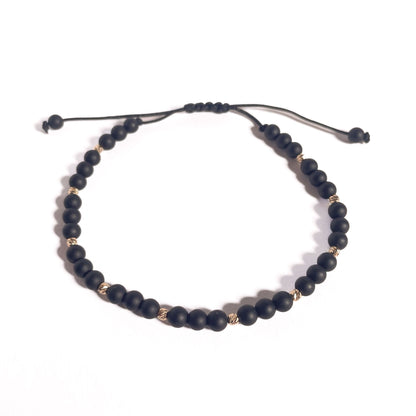 Brățară Onix Mat 4 mm cu bile din aur 14K pe șnur reglabil negru